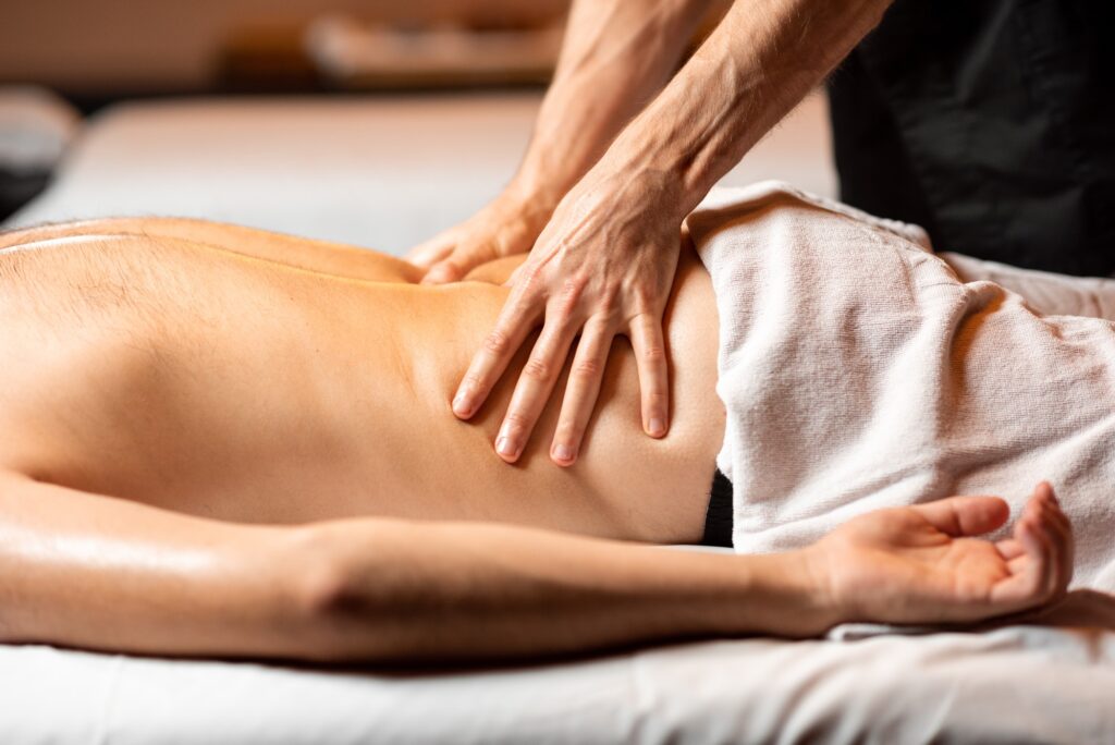 Man receiving a deep massage